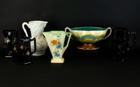 Small Collection of Assorted Pottery including Three Victorian Black Graduated Jugs of hexagonal