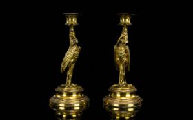 A Pair Of Late 19th Century Candlesticks In The form Of A Crane With Gecko Two brass candlesticks on