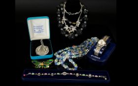 A Collection Of Vintage Costume Jewellery Seven items in total, a varied lot, to include,