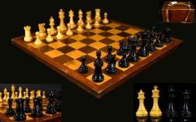 Staunton Boxwood and Ebony chess set, Three rooks and two knights stamped with a red crown,
