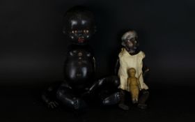German Armand Marseille 390 Bisque Doll. Painted Black Circa 1910 Together With a Pedigree Hard