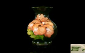 Moorcroft Small Globular Shaped Vase ' Coral Hibiscus ' Design. c.1980's. Height 3.75 Inches.