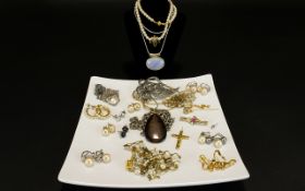 A Collection of Mixed Costume Jewelry To include marcasite set brooch, stone set brooch,
