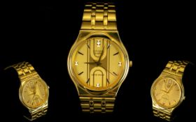 Citizen Vintage Fashion Watch Gold tone watch with brushed gold tone link bracelet.