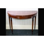 A Mahogany Gate Fold Console Table. Circular top with Neoclassical style legs and hinged top. Dia 41