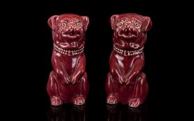 Victorian Period Pair Of Handpainted Ceramic Maroon Pug Dog Figures Fashioned in sitting position,