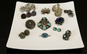 A Collection of Silver Tone Vintage Costume Jewelry Twelve items in total to include: Late 19th