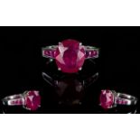 Ruby Raised Solitaire Ring, an 8.5ct ova