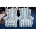 A Pair of Wing Back Arm Chairs Two arm c
