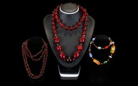 Three Vintage Bead Necklaces A varied co