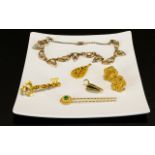 A Collection of Gold Tone Vintage Jewelr