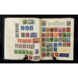 Blue Universal Stamp Album well filled w