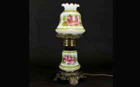 A Decorative Brass and Ceramic Oil Lamp,