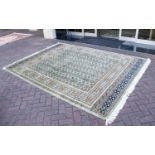 A Very Large Woven Silk Bokhara Carpet O