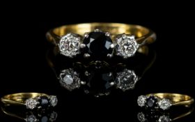 18ct Gold and Platinum 3 Stone Diamond and Sapphire Set Dress Ring. The Central Sapphires Flanked by