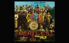 Peter Blake(Artist) autograph on cover. The Beatles L.P. cover, S&T. Pepper....super.