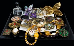 A Large Collection Of Vintage Costume Jewellery And Accessories A varied box to include a large