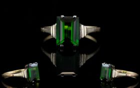 Art Deco Style Single Step-Cut Emerald Coloured Stone Set Dress Ring of Attractive Form. Marked 9ct.