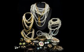 A Quantity Of Mixed Costume Jewellery Large mixed bag containing several items of varying designs,