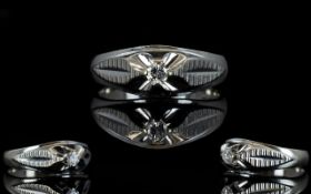 Contemporary Design 18ct White Gold Single Stone Diamond Ring. Features a Colourless Small Diamond.