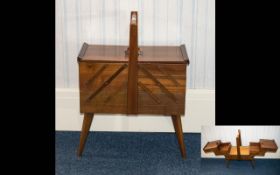 A Mid Twentieth Century Workbox Rectangular sewing box with splayed legs and three hinged trays
