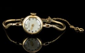 Ladies Marvin - Mechanical 9ct Gold Watch with Integral 9ct Gold String Bracelet with Twist Design.