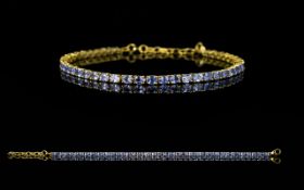 Tanzanite Tennis Bracelet, a single row of oval cut tanzanites,