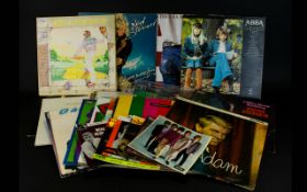 A Collection Of Vinyl LP's And Singles Approx 40 items in total to include,