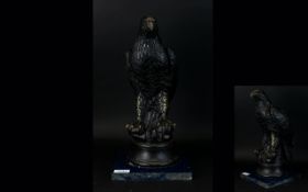 A Vintage Bronzed Plaster Figure In The Form Of An American Eagle Raised on circular base attached