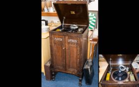 His Masters Voice Antique Cabinet Gramophone with two double cupboard doors to front with scrolling