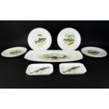 Collection of Ceramic Plates with Fish Design Decoration.