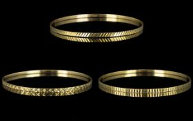 A Collection of 1970's 9ct Gold Bangles ( 3 ) Three In Total. All with Diamond Cut Decoration.