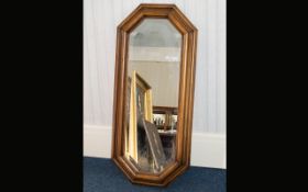 Bevelled Glass Mirror A lozenge shaped mirror in rustic style frame with aged patina.