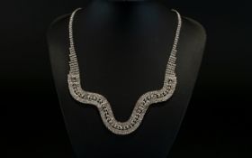 White Crystal Curved Front Necklace, rows of white Austrian crystal with a row of silver colour