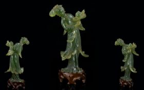 Oriental Jadeite Carved Figure Of A Deity Female figure in flowing robes proffering a tray with