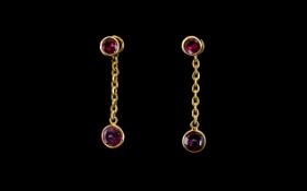 Ladies - Nice Quality and Attractive 9ct Gold Pair of Drop Earrings Set with Amethysts.