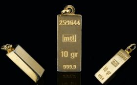 24 ct Gold Ingot. 10 Grains - 6.8 grams. Marked 999.9 - Please See Photo.