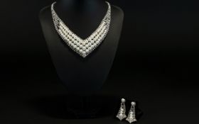 White Crystal and Faux Pearl Necklace and Earrings Set, three rows of white faux pearls set on an