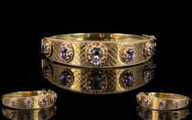 Ladies - 1960's Fine Quality Hinged Bangle Set with Five Faceted Amethysts of Good Colour and