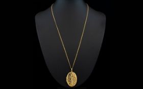 Contemporary Designed 9ct Gold Oval Shaped Hinged Locket with Stylish Chased Floral Decoration to