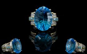 Swiss Blue Topaz Statement Ring, a large oval cut solitaire Swiss Blue topaz of 19cts,