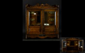 Early 20th Century Oak Smokers Cabinet Double glazed doors with four small drawers with central