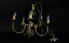 Five Branch Chandelier in a bronzed matt finish.