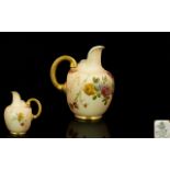 Royal Worcester Hand Painted Blush Ivory Helmet Shaped Jug, Decorated with Images of Spring Flowers.