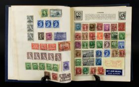 Blue Universal Stamp Album well filled with stamps mostly from Victorian times to 1950's. Also