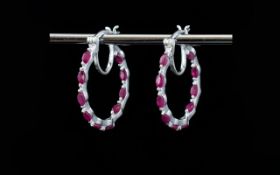 Ruby Hoop Earrings, marquise cut rubies of good colour, totalling 2.