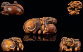 Japanese 19th Century Nice Quality - Signed Carved Boxwood Netsuke, Depicting a Buffalo and Baby. c.