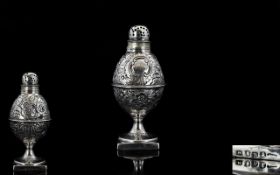 George III Superb Silver Pepperette of Egg Shape, with Deep Embossed Floral Decoration to Body.