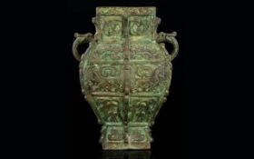 A Late 19th Century Bronze Archaic Style Vase Antique twin handle sectional vase with