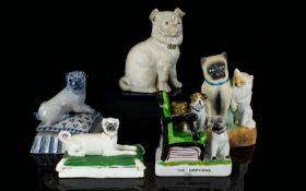 A Collection Of Ceramic Pug Dog Figurine